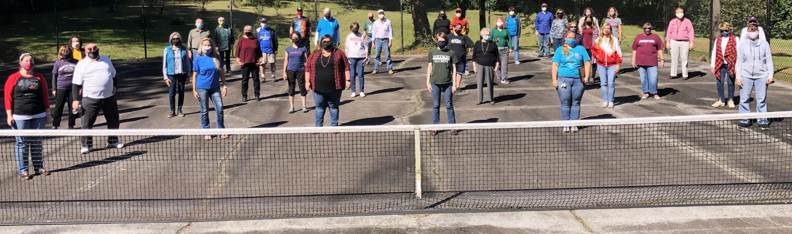 Chorus makes 'racket' from Marietta tennis court in socially distanced rehearsal